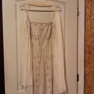 Champagne gown with matching sash.